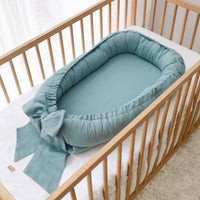 Linnen babynest met strik